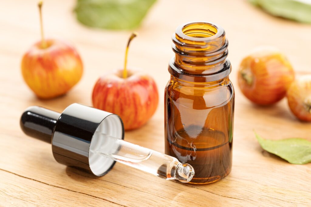 Apple essential oil bottle