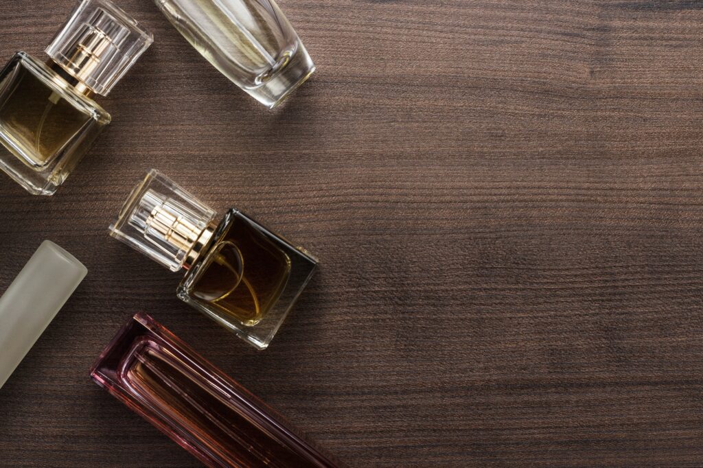 Different Perfume Bottles On The Table