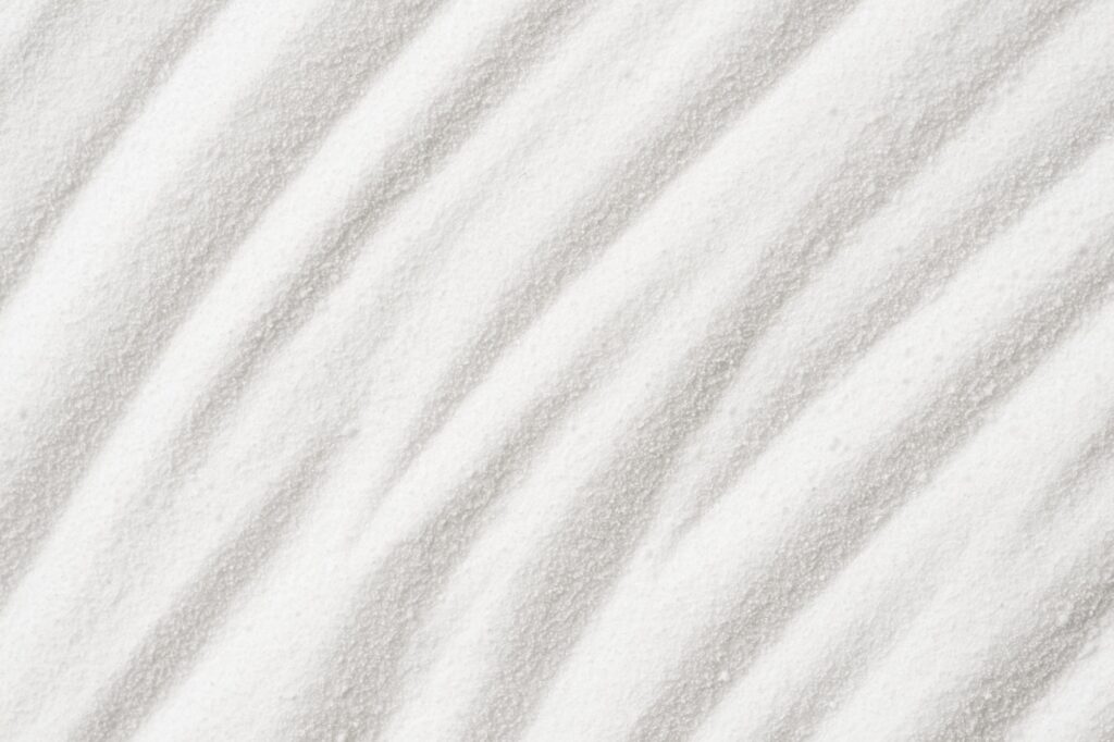 Sand texture rough Surface with wave ripple background, Naturally White Silica sand with copy space