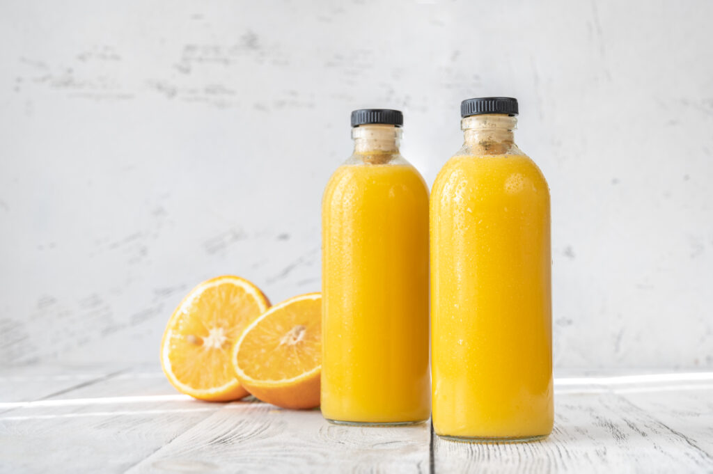 Two bottles of orange juice