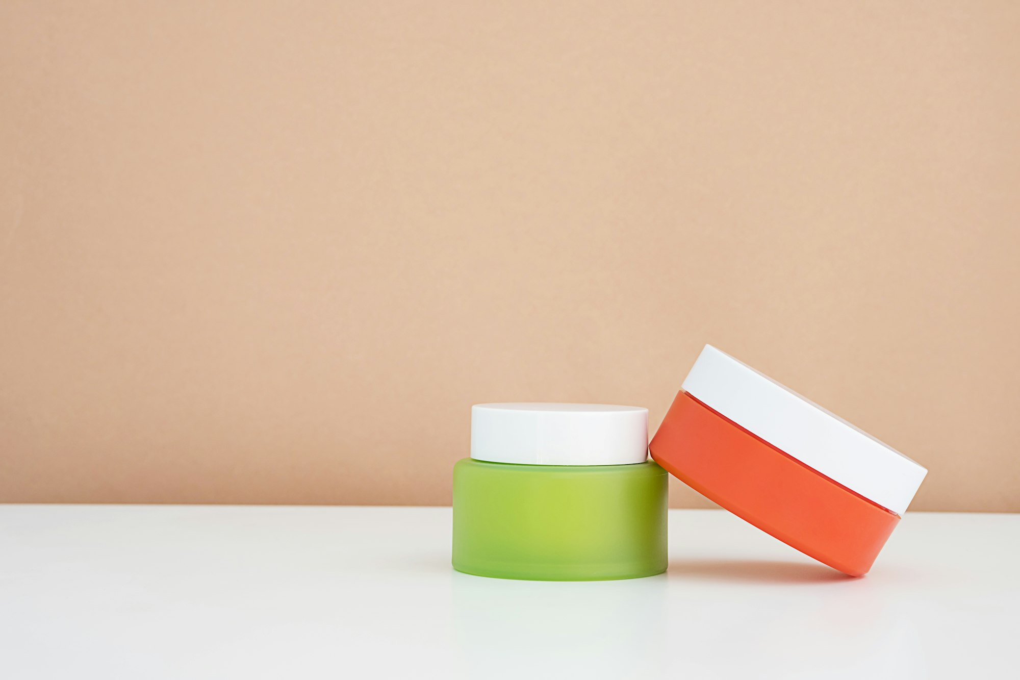 Mock Up Colourful Cosmetic Jars.