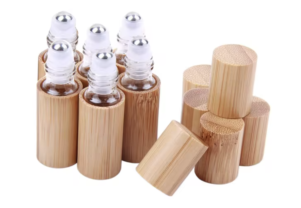 Bamboo roller bottles with bamboo caps and glass interiors.