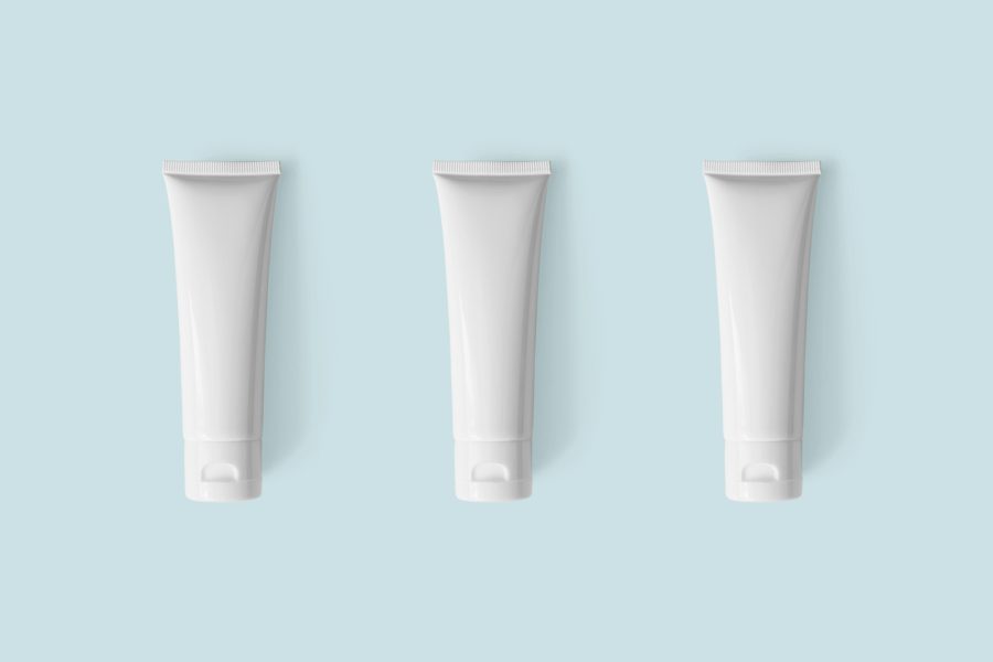 Mockup white plastic tubes for cosmetic product, top view